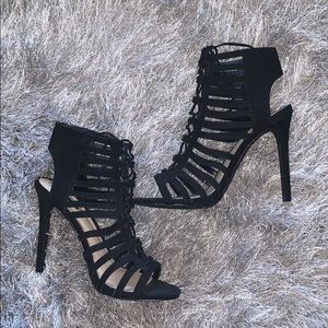Solid black caged heels